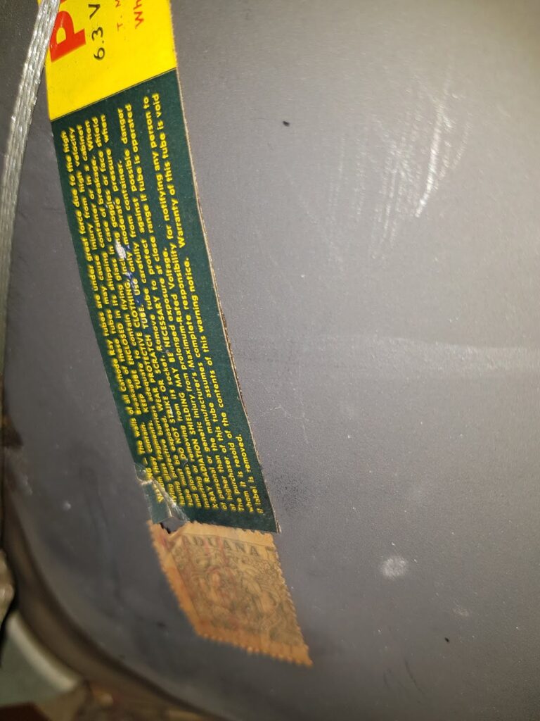 Detalle de la advertencia del tubo de imagen Philco 23CP4